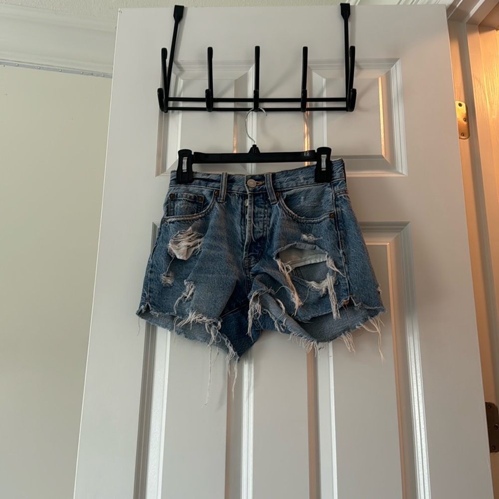 Blue ripped jean shorts
